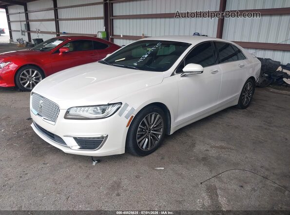 3LN6L5A91KR629499 2019 LINCOLN MKZ White წინა მარცხენა ხედი სამი მეოთხედიდან