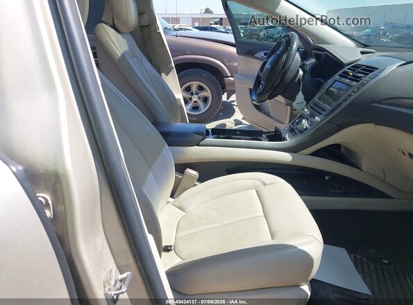 3LN6L5C99HR608356 2017 LINCOLN MKZ Желто-коричневый Вид салона спереди