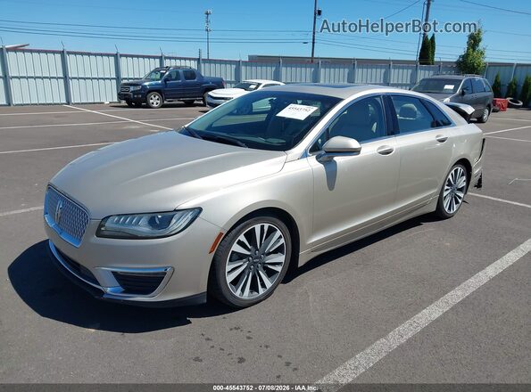 3LN6L5LU1HR624958 2017 LINCOLN MKZ HYBRID Gold წინა მარცხენა ხედი სამი მეოთხედიდან