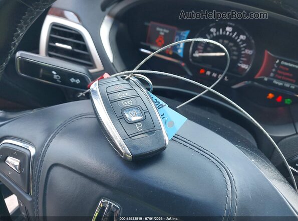 3LN6L5MU5HR603528 2017 LINCOLN MKZ HYBRID Серебряный Вид панели приборов