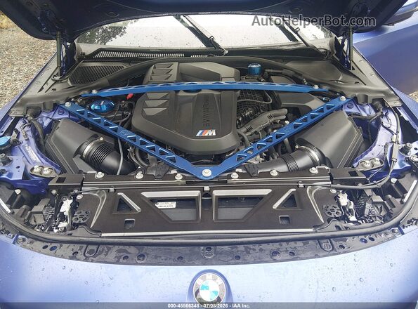 3MF13DM0XR8E63048 2024 BMW M2 Purple Widok z tyłu