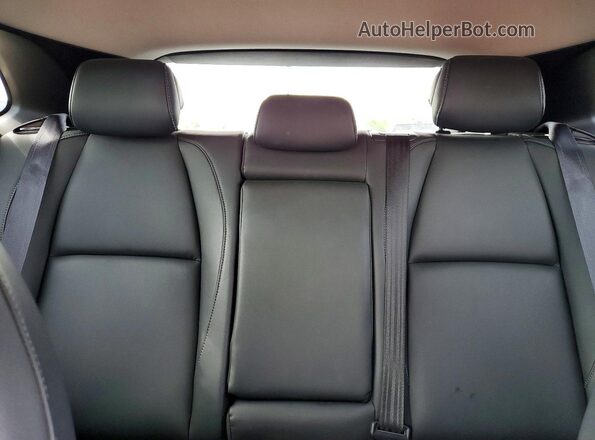 3MVDMBBM9RM636877 2024 MAZDA CX-30 Red Rear seats view