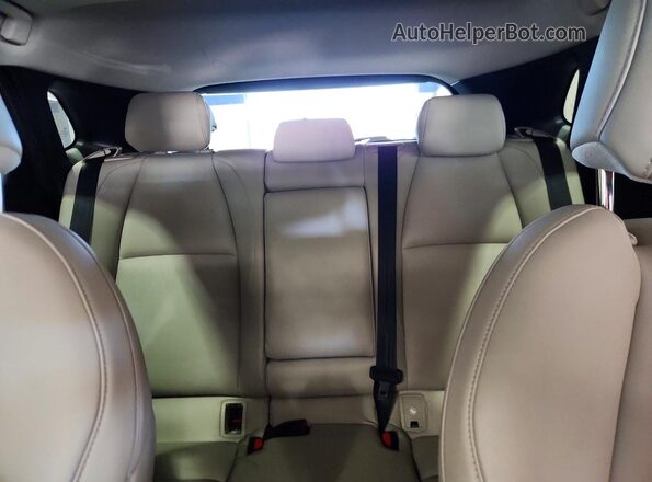 3MVDMBCL3NM408616 2022 MAZDA CX-30 Red Rear seats view