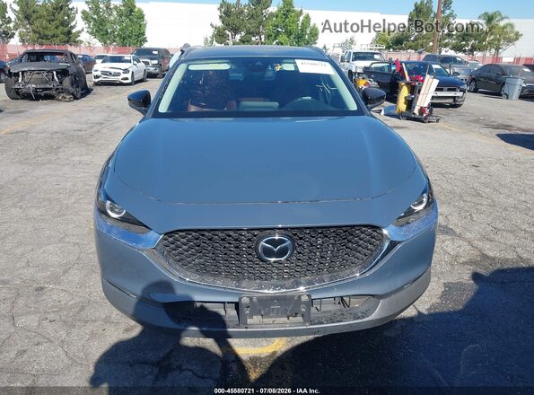 3MVDMBCM0PM560719 2023 MAZDA CX-30 Teal Սալոնի հետևի տեսք