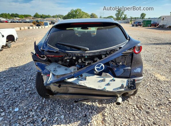 3MVDMBCM5RM682320 2024 MAZDA CX-30 Blue Rear view