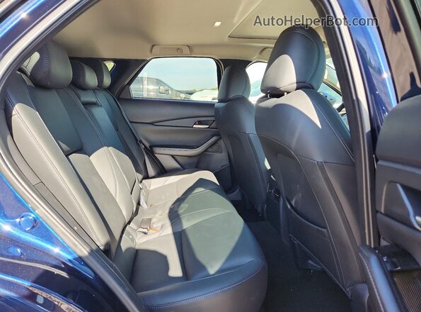 3MVDMBCM5RM682320 2024 MAZDA CX-30 Blue Rear interior view
