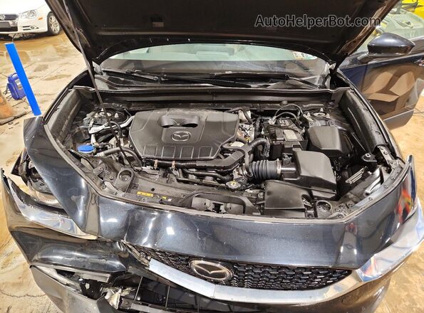 3MVDMBCM7RM614729 2024 MAZDA CX-30 Black Vista del compartimento del motor