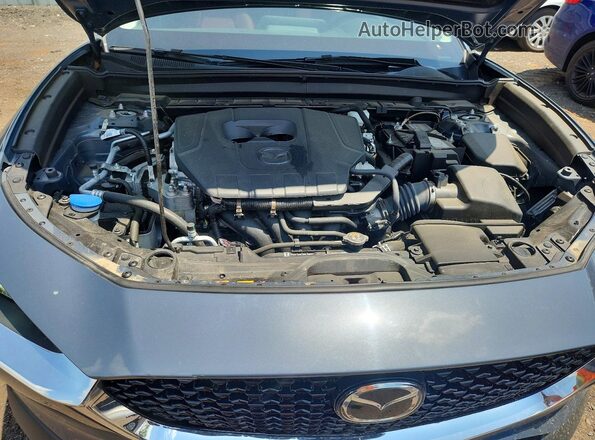 3MVDMBCM7RM671822 2024 MAZDA CX-30 Blue Vista interior trasera