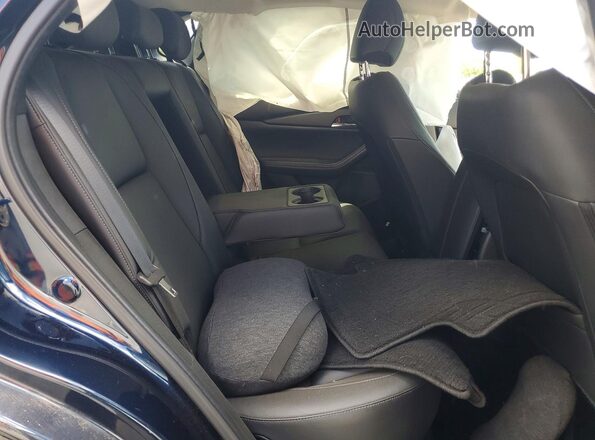 3MVDMBCM8RM716640 2024 MAZDA CX-30 Blue Rear interior view