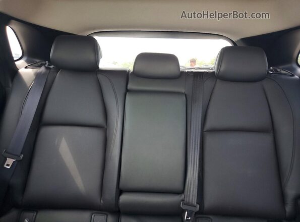 3MVDMBDM7RM600425 2024 MAZDA CX-30 White Rear seats view