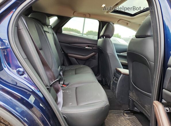 3MVDMBDY6RM668928 2024 MAZDA CX-30 Blue Rear interior view
