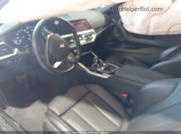 3MW23CM06N8C49196 2022 BMW 2 SERIES Black Вид салону спереду