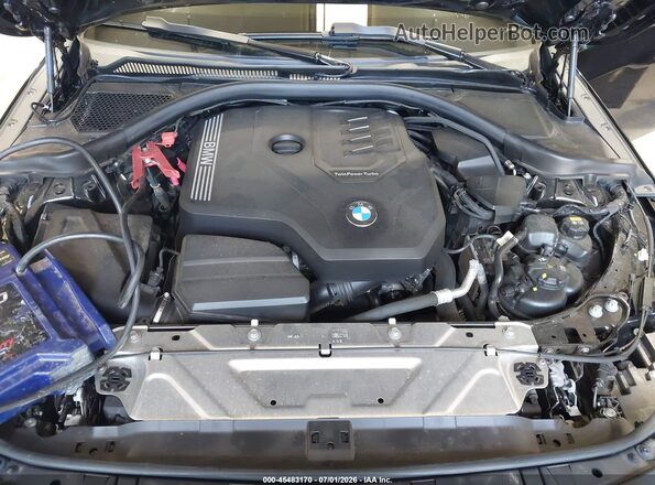 3MW23CM06N8C49196 2022 BMW 2 SERIES Black Вид ззаду