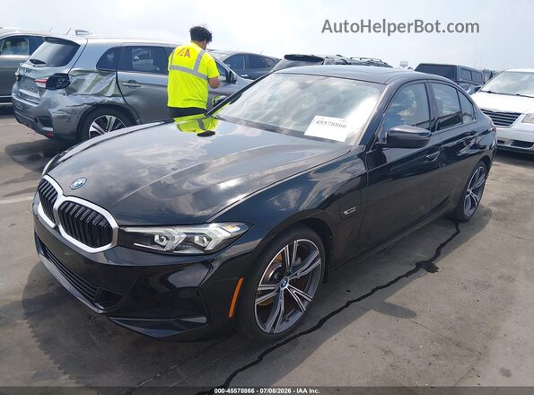 3MW39FF09P8D05894 2023 BMW 3 SERIES Black წინა მარცხენა ხედი სამი მეოთხედიდან