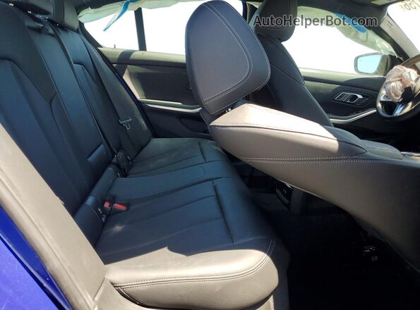 3MW49FF07P8D76127 2023 BMW M3 Blue Vista de los asientos traseros