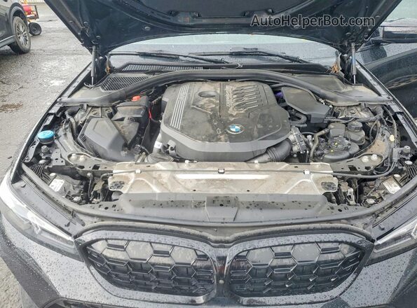 3MW49FF07P8D78668 2023 BMW M3 Black Սալոնի հետևի տեսք