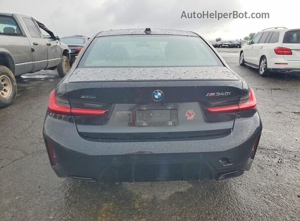 3MW49FF07P8D78668 2023 BMW M3 Black Հետևի տեսք