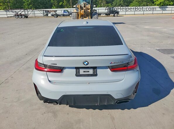 3MW49FF0XR8D93703 2024 BMW M3 Серебряный Вид сзади