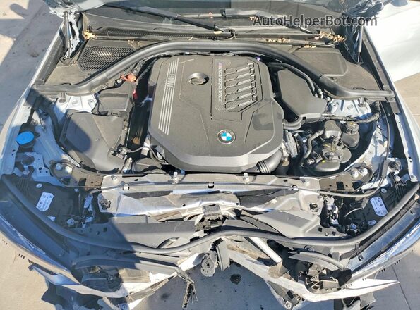 3MW49FF0XR8D93703 2024 BMW M3 Серебряный Вид задней части салона