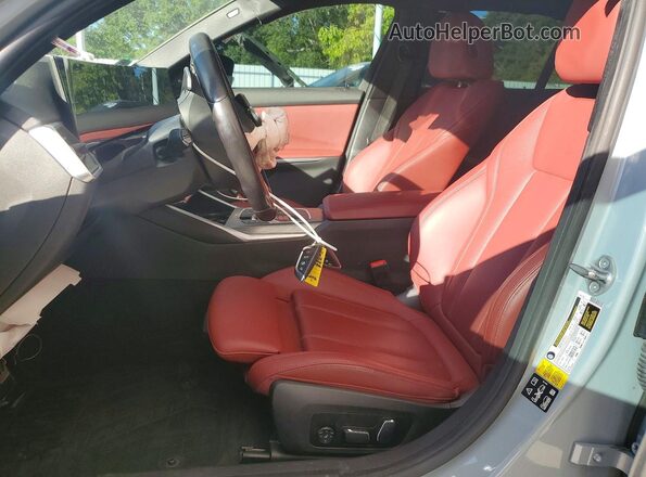 3MW49FF0XR8D93703 2024 BMW M3 Серебряный Вид салона спереди