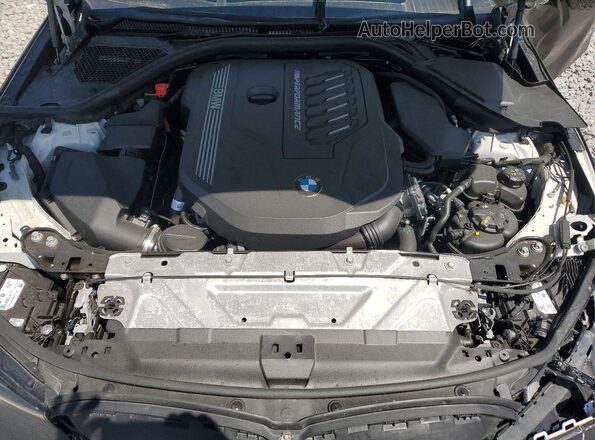 3MW49FS01P8D35224 2023 BMW M3 Charcoal Սալոնի հետևի տեսք