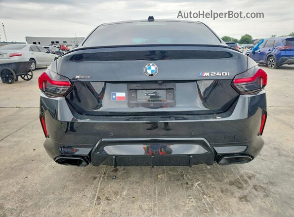 3MW53CM05R8E12228 2024 BMW M2 Black Հետևի տեսք