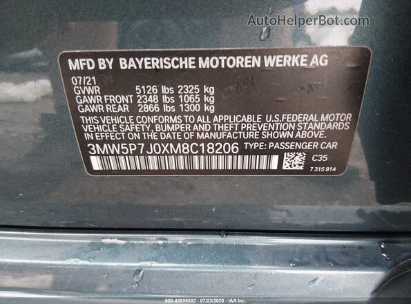 3MW5P7J0XM8C18206 2021 BMW 3 SERIES Turquoise Engine compartment view