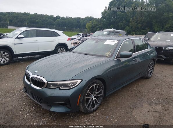 3MW5P7J0XM8C18206 2021 BMW 3 SERIES Turquoise Front left