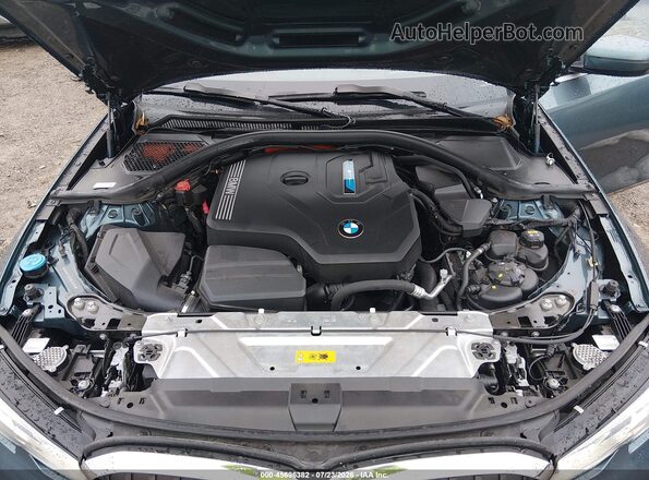 3MW5P7J0XM8C18206 2021 BMW 3 SERIES Turquoise Rear view