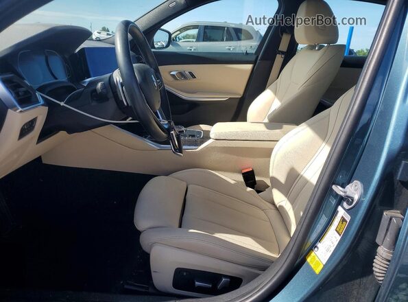 3MW5R1J02M8B94944 2021 BMW 3 SERIES Teal Front interior view