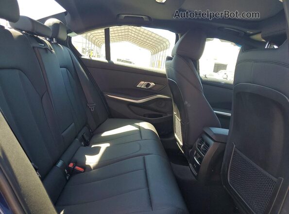 3MW5R1J0XM8B94982 2021 BMW 3 SERIES Blue Rear seats view