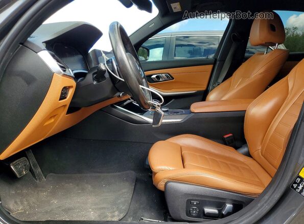 3MW5R7J02L8B07724 2020 BMW 3 SERIES Charcoal Front interior view