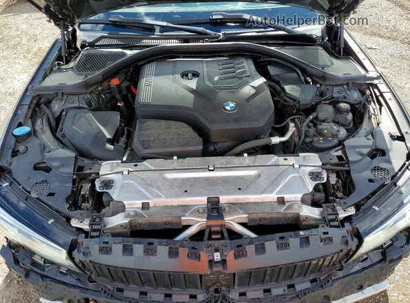 3MW5R7J02L8B07724 2020 BMW 3 SERIES Charcoal Rear interior view