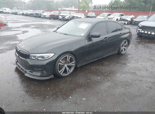 3MW5R7J05N8C67020 2022 BMW 3 SERIES Black წინა მარცხენა ხედი სამი მეოთხედიდან