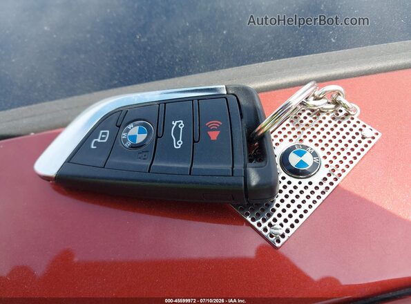 3MW5R7J07M8B99690 2021 BMW 3 SERIES Orange Widok deski rozdzielczej