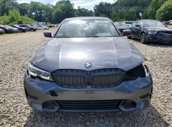 3MW5R7J09N8C51676 2022 BMW 3 SERIES Gray Widok z przodu