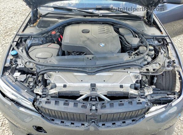 3MW5R7J09N8C51676 2022 BMW 3 SERIES Gray Widok wnętrza z tyłu