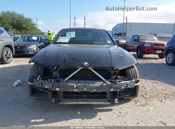 3MW5U7J05N8C41922 2022 BMW M3 Black Սալոնի հետևի տեսք