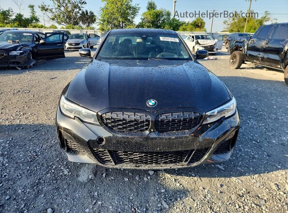 3MW5U9J07M8B65498 2021 BMW M3 Black Դիմացի տեսք