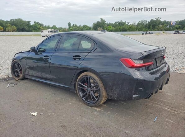 3MW69FF06P8C93779 2023 BMW 3 SERIES Black Trasero izquierdo