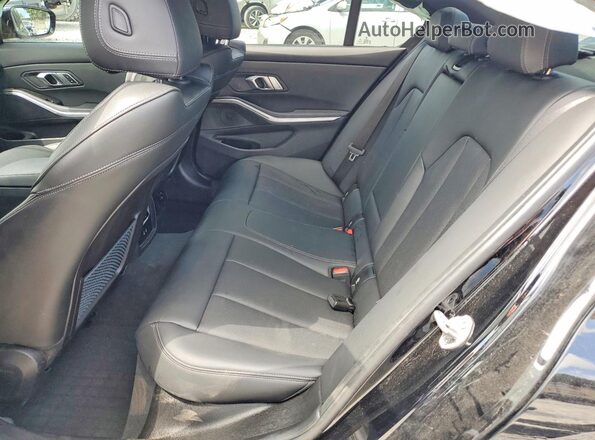 3MW69FF07P8C98702 2023 BMW 3 SERIES Black Widok tylnych siedzeń