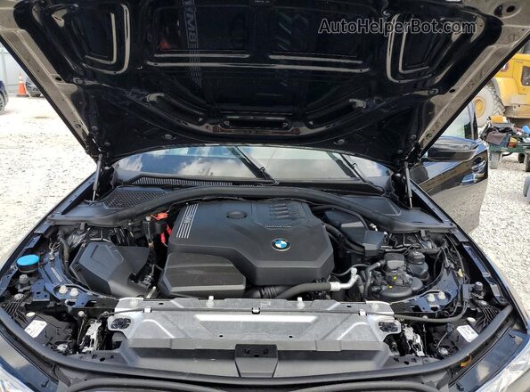 3MW69FF07P8C98702 2023 BMW 3 SERIES Black Widok wnętrza z tyłu