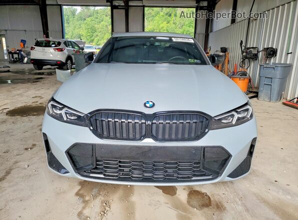 3MW89FF0XP8D66502 2023 BMW 3 SERIES Gray Вид спереду