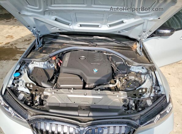 3MW89FF0XP8D66502 2023 BMW 3 SERIES Gray Вид задньої частини салону