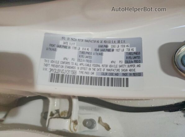 3MYDLBYV0JY311568 2018 TOYOTA YARIS White VIN sticker view