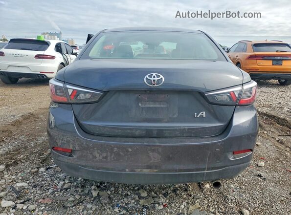 3MYDLBYV0JY329956 2018 TOYOTA YARIS Gray უკანა ხედი