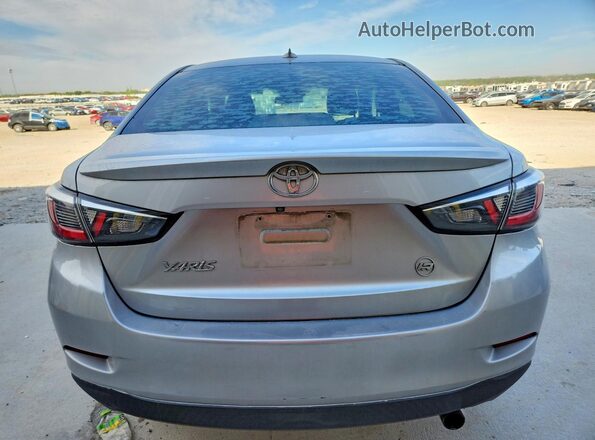 3MYDLBYV0KY508886 2019 TOYOTA YARIS Silver Հետևի տեսք