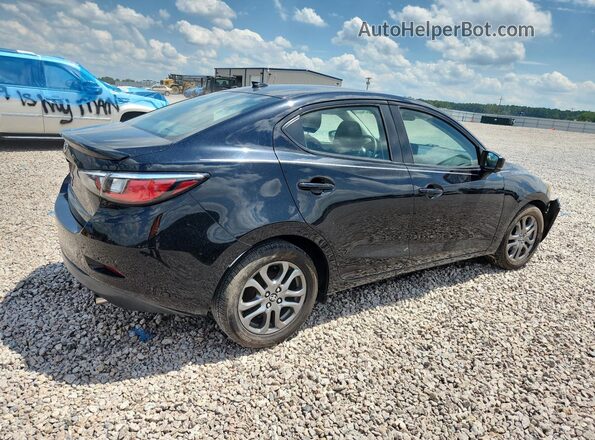 3MYDLBYV2KY516472 2019 TOYOTA YARIS Black Trasero derecho