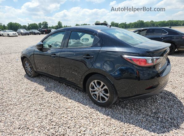 3MYDLBYV2KY516472 2019 TOYOTA YARIS Black Trasero izquierdo