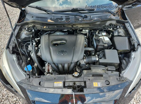 3MYDLBYV2KY516472 2019 TOYOTA YARIS Black Vista interior trasera